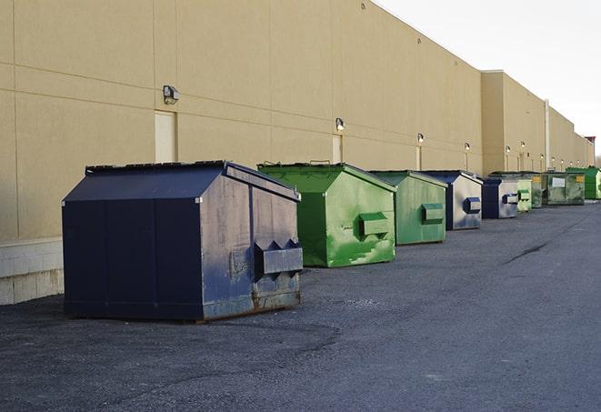 an arrangement of durable and robust disposal containers utilized on a construction project in Keene